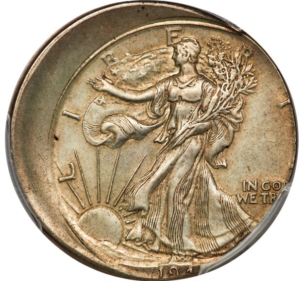 1947 Walking Liberty half dollar off-center strike error showing partial design with blank planchet crescent area